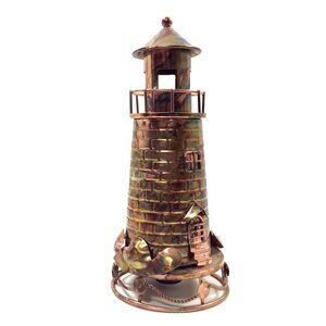 Vintage Lighthouse Tin Wind Up Music Box Copper Color Plays Light Up My Life